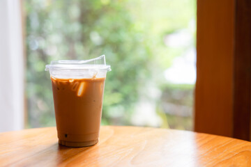 Coffee in a plastic cup to take home