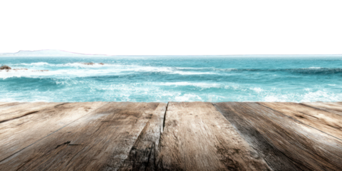 Ocean waves crashing on a wooden pier