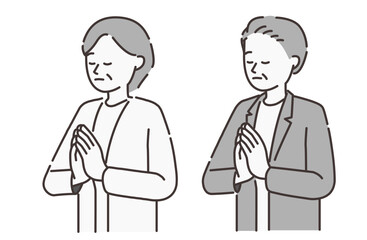 合掌する年配の男性と女性