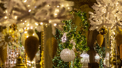 Festive Christmas and New Year decorations with sparkling lights and ornaments create a magical atmosphere, enhancing the holiday spirit and inviting joy and celebration into the space