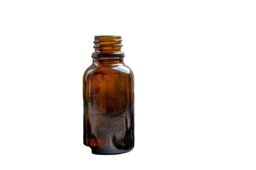 Amber glass bottle, slightly mottled, sits upright against a black background.  Its rectangular shape and screw-on cap are clear
