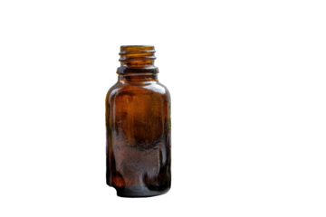 Amber glass bottle, slightly mottled, sits upright against a black background.  Its rectangular shape and screw-on cap are clear