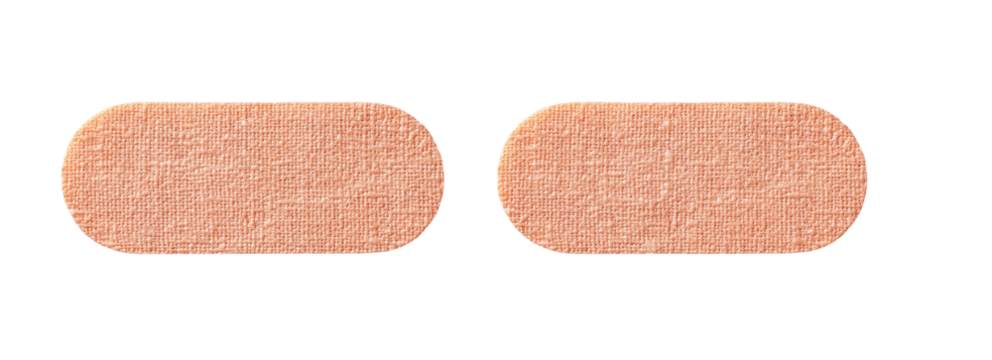 Two light peach-colored oval tablets