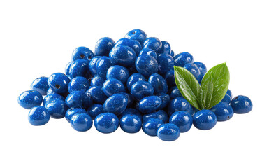 A pile of vibrant blue candies, resembling blueberries, with fresh green leaves