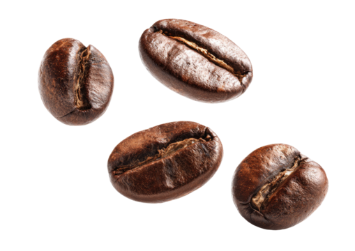 Roasted coffee beans, close-up, isolated on black background. Four whole beans, various angles, displaying texture and color
