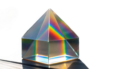 Abstract rainbow glass prism with glowing crystal sparkles isolated PNG