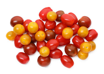 Obraz premium Heap of different ripe juicy tomatoes isolated on white, top view