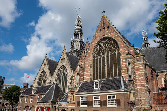 Amsterdam Old Church (Oude Kerk), oldest parish church, founded in 1213. Oude Kerk stands in Amsterdam De Wallen district on Old Church's Square (Oudekerksplein). Amsterdam, The Netherlands.