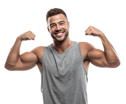 Happy muscular man flexing his biceps - Powered by Adobe