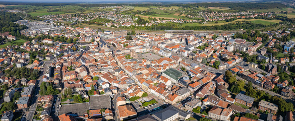 An aerial panorama view around the old town in the city Sarrebourgt in France on a sunny day in early spring