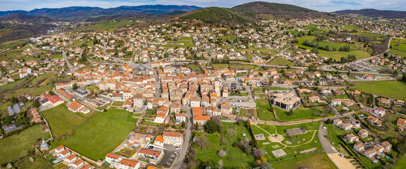 An aerial panorama view around the old town in the city Boulieu-lès-Annonay in France on a sunny morning in early spring