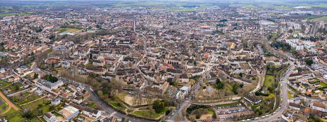 An aerial panorama view around the old town in the city Beaune in France on a sunny morning in early spring