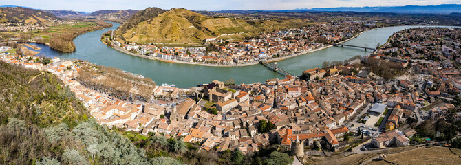 An aerial panorama view around the old town in the city Tournon-sur-Rhône in France on a sunny morning in early spring
