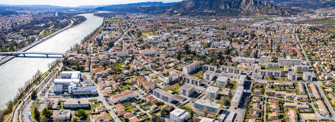 An aerial panorama view around the old town in the city Granges in France on a sunny morning in early spring