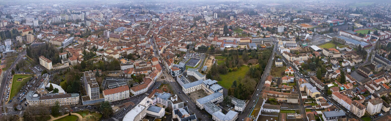 An aerial panorama view around the old town in the city Bourg-en-Bresse in France on a cloudy morning in early spring