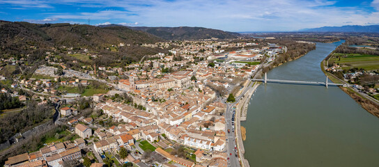 An aerial panorama view around the old town in the city La Voulte-sur-Rhône  in France on a sunny morning in early spring
