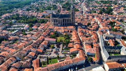 An aerial panorama view around the old town in the city Saint-Nicolas-de-Port in France on a sunny afternoon in early spring