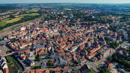 An aerial panorama view around the old town in the city Sarrebourg in France on a sunny afternoon in early spring