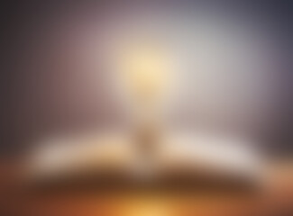 Enlightenment: Open Book with Glowing Lightbulb - Knowledge, Inspiration, and Ideas
