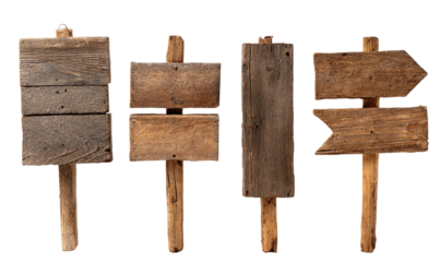 Four weathered wooden signs, various shapes and styles