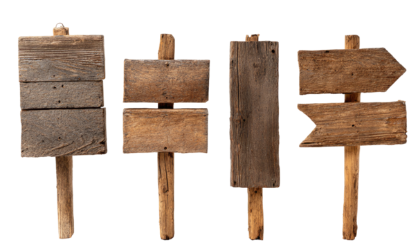 Four weathered wooden signs, various shapes and styles