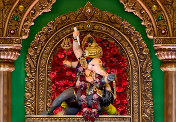 Fototapeta premium 27 August 2025, Pune, Maharashtra, India, Beautiful idol of Lord Ganesh installed by Bhausaheb Rangari Ganpati during Ganesh festival 2025.