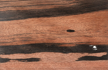 High resolution top view photo of natural ebony wood panel texture background grain texture, perfect for use as wallpaper, or design element.