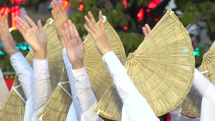 TOKYO, JAPAN - AUG 2025 : Awa Odori dance festival in Koenji. Powerful and energetic dance and music. Traditional Japanese summer event in Tokyo. Slow motion shot of dancer.