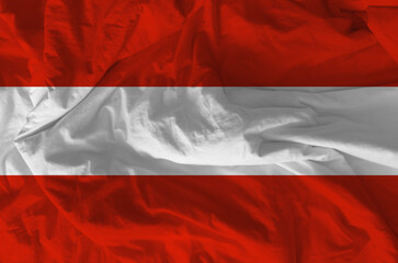 Stylized image of Austrian flag with crumpled paper texture and halftone effect. Concept of statehood.