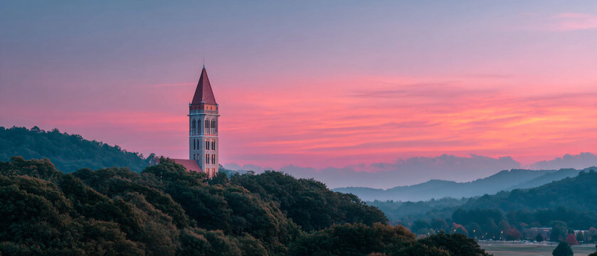 University Tower Silhouette, Gradient Evening Sky Web Header Template
