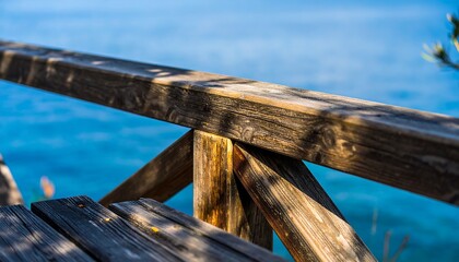 Wooden seaside railing, close-up view
