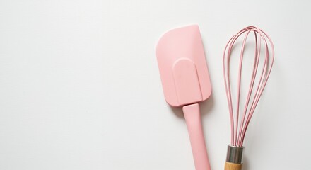 Pink baking tools on white background