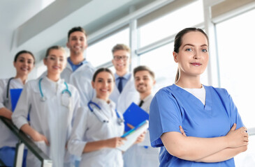 Obraz premium Medical assistant and other healthcare workers in hospital, selective focus