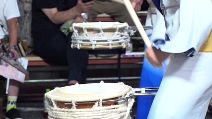 TOKYO, JAPAN - AUG 2025 : Slow motion shot of Awa Odori dance festival in Koenji. Powerful and energetic dance and music. Traditional Japanese summer event in Tokyo. Close up shot of drum.