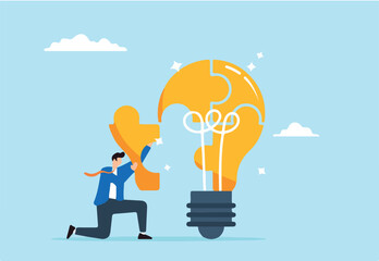 Smart businessman solving lightbulb idea puzzle by connecting last jigsaw piece, illustrating problem solver. Concept of find solutions, overcome difficulties through ideas, creativity, and innovation