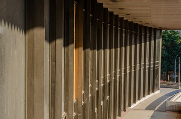 modern architectural facade with sunlight and shadows