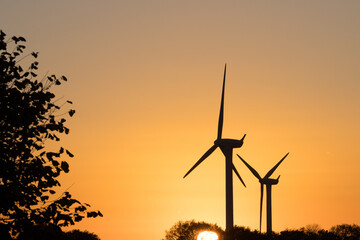Obraz premium Wind turbines as wind power concept