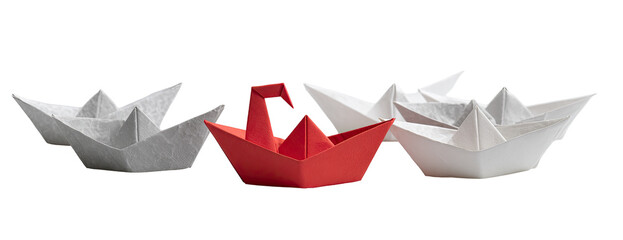 Three origami boats; one red, two white