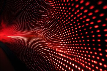 Obraz premium Red LED lights on the wall, digital light pattern, red background, symmetrical composition, 