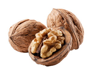 Close-up of three walnuts, two whole and one cracked open, displaying the nutmeat inside.  