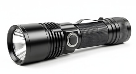 Close up shot of a black metal flashlight with a button and clip lying on a white surface indoors