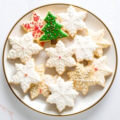 Festive Christmas cookies, iced and decorated with snowflakes and a tree