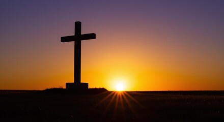 Close of Christian cross at sunset symbolizing faith in Christ Jesus and salvation