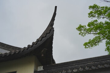 Nantong, Jiangsu, China: 04 21 2025: Beautiful Jiangsu traditional Chinese building, Roof, wall, tile and door