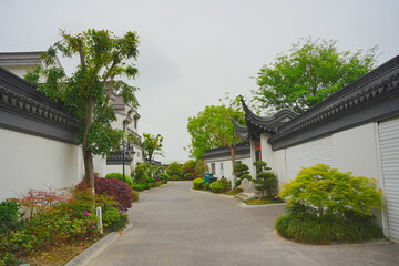 Nantong, Jiangsu, China: 04 21 2025: Beautiful Jiangsu traditional Chinese building, Roof, wall, tile and door
