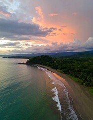 Coastal sunset over tropical beach
