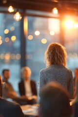 person giving presentation in cozy modern room with warm lighting and large windows