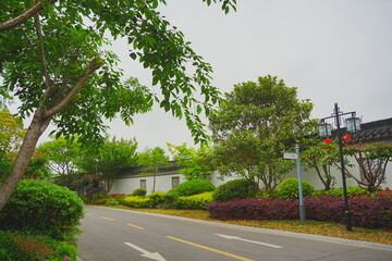 Nantong, Jiangsu, China: 04 21 2025: Beautiful Jiangsu traditional Chinese building, Roof, wall, tile and door