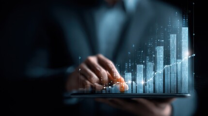 Business professional analyzing data trends using a tablet with graphs and charts in a modern office setting