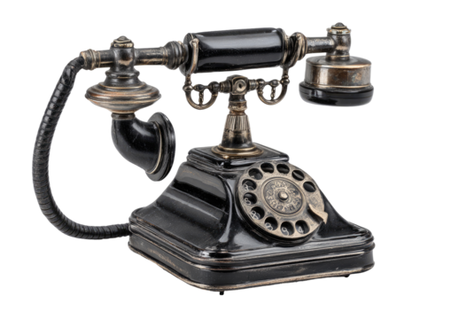 Vintage black telephone with ornate brass accents.  
